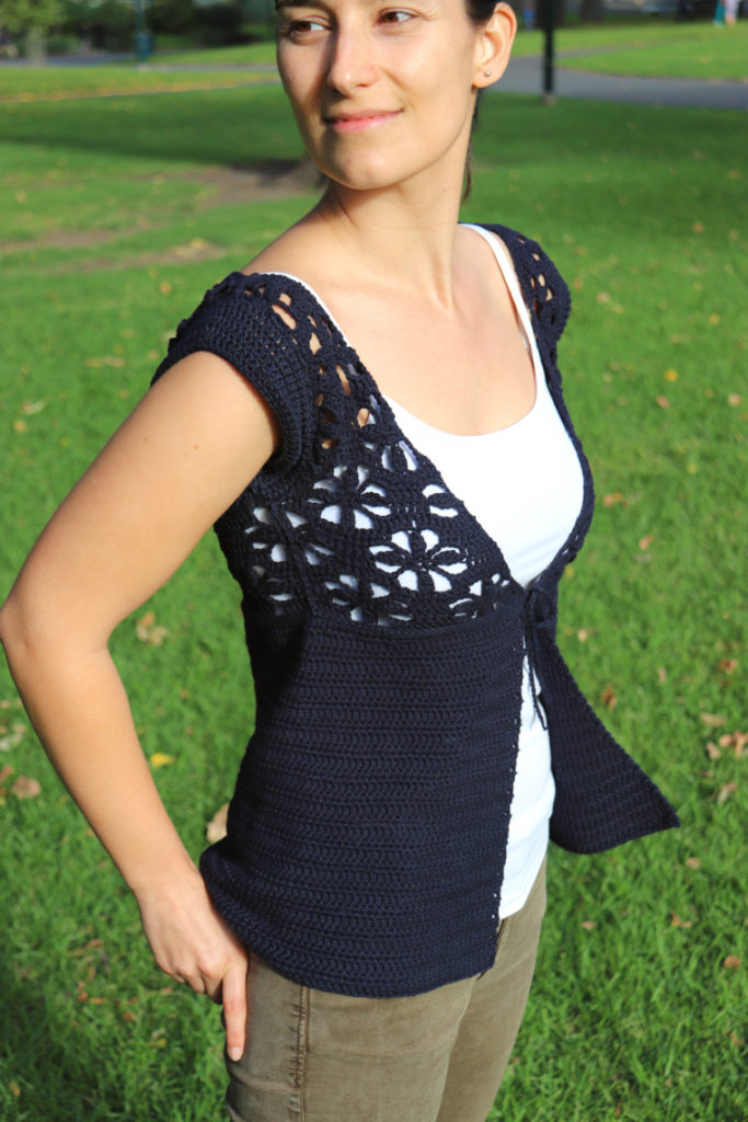 Woman wearing the Floral Summer Cardi seen from the side and front