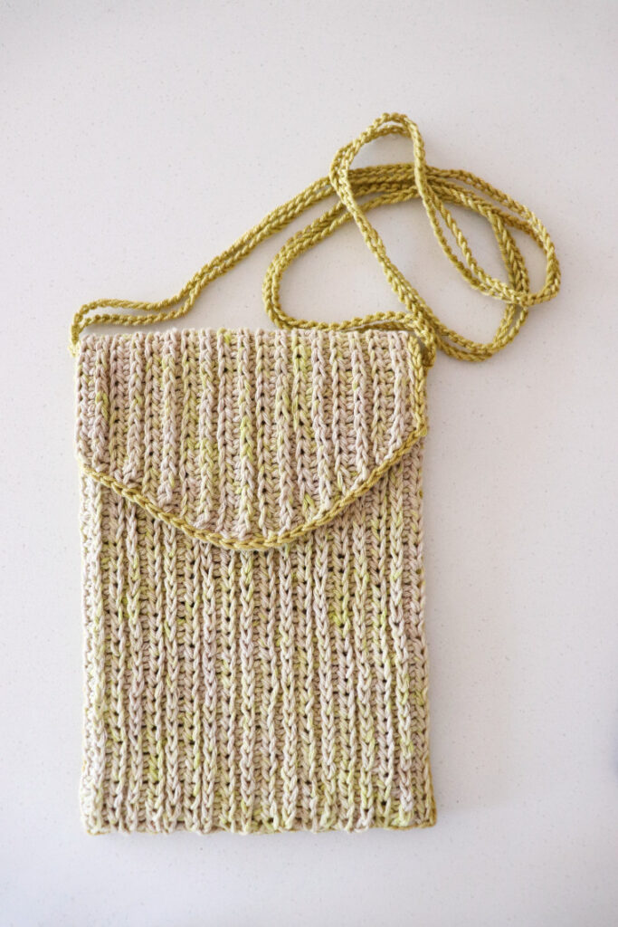 The crochet Highlights Bag against a white surface